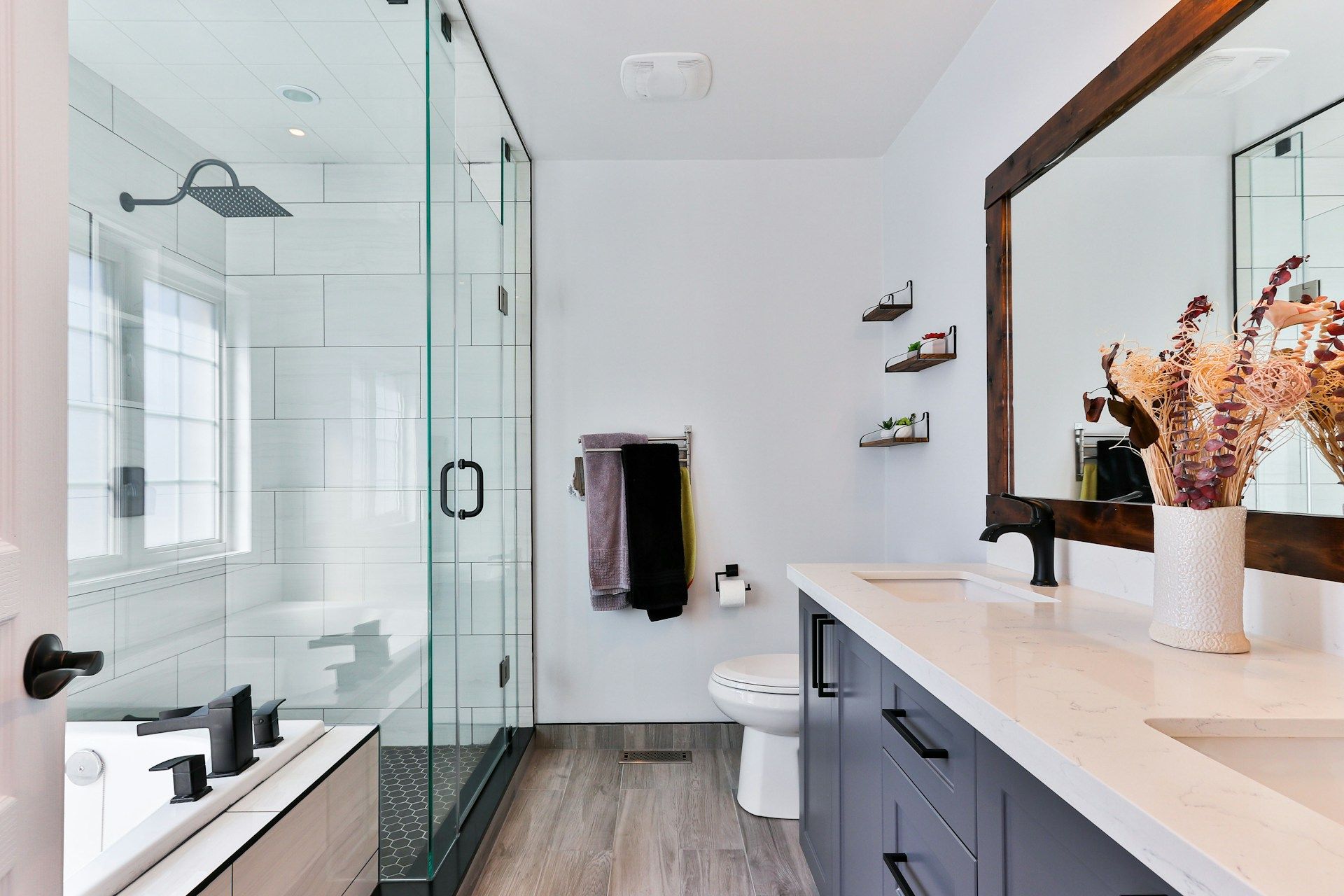 Modern luxury walk-in shower with rainfall heads
